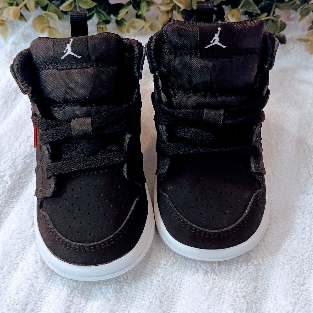Brand New! Black Air Jordan for babies or toddlers 10-12 months old.  Size 4C